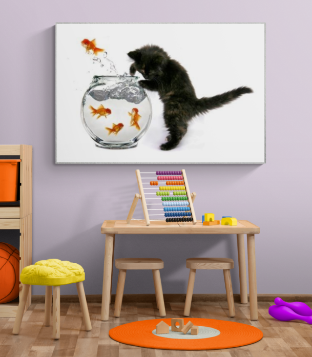 Black Kitten Playing in Goldfish Bowl