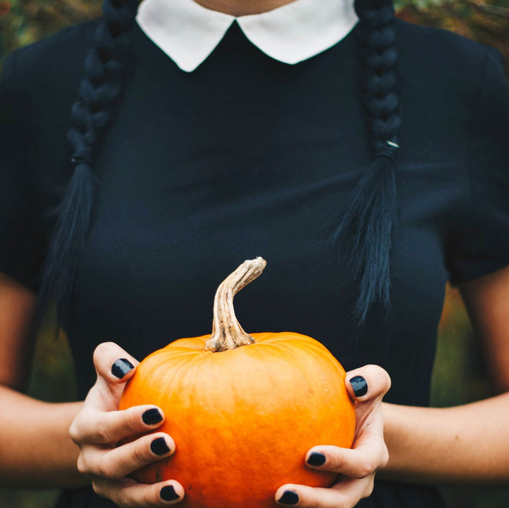 Wednesday Costume with Pumpkin
